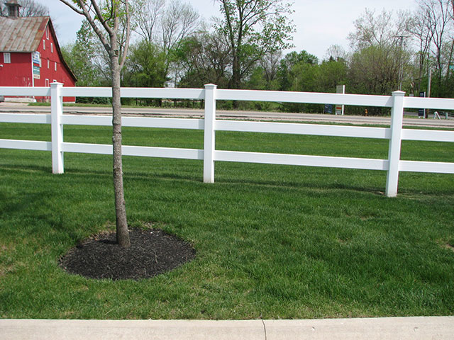 Residential vinyl split rail fence