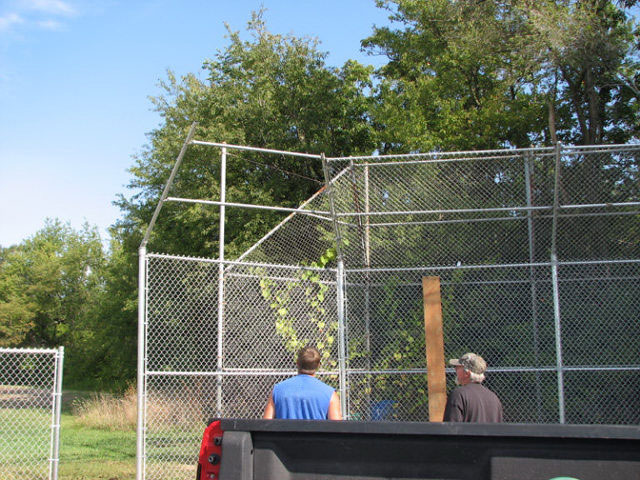 Commercial chainlink backstop by Pickens Fence